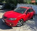Красный Мазда 3, объемом двигателя 1.6 л и пробегом 151 тыс. км за 6300 $, фото 1 на Automoto.ua