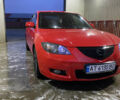 Красный Мазда 3, объемом двигателя 2 л и пробегом 239 тыс. км за 5000 $, фото 1 на Automoto.ua