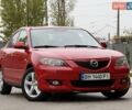 Красный Мазда 3, объемом двигателя 1.6 л и пробегом 207 тыс. км за 4400 $, фото 1 на Automoto.ua