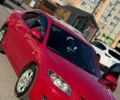 Красный Мазда 3, объемом двигателя 2 л и пробегом 230 тыс. км за 6000 $, фото 1 на Automoto.ua