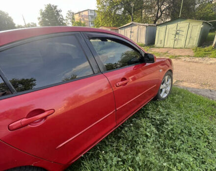Червоний Мазда 3, об'ємом двигуна 2 л та пробігом 290 тис. км за 3990 $, фото 1 на Automoto.ua
