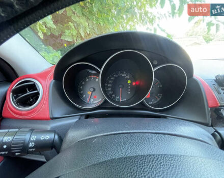 Красный Мазда 3, объемом двигателя 1.6 л и пробегом 193 тыс. км за 5700 $, фото 27 на Automoto.ua