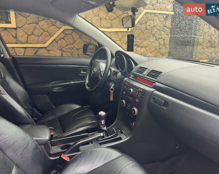 Червоний Мазда 3, об'ємом двигуна 1.6 л та пробігом 350 тис. км за 4350 $, фото 9 на Automoto.ua