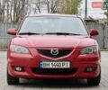 Красный Мазда 3, объемом двигателя 1.6 л и пробегом 207 тыс. км за 4400 $, фото 2 на Automoto.ua