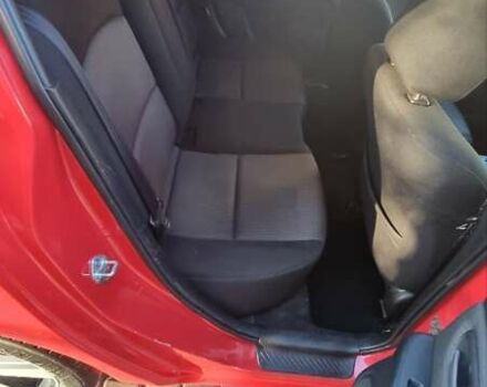 Червоний Мазда 3, об'ємом двигуна 1.6 л та пробігом 150 тис. км за 5550 $, фото 12 на Automoto.ua