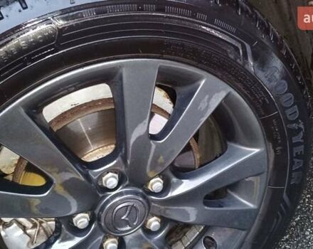 Красный Мазда 3, объемом двигателя 1.6 л и пробегом 161 тыс. км за 5450 $, фото 13 на Automoto.ua