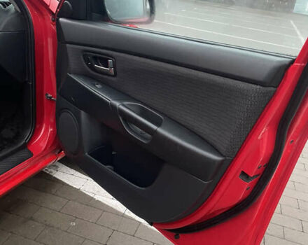 Красный Мазда 3, объемом двигателя 2 л и пробегом 295 тыс. км за 5099 $, фото 9 на Automoto.ua