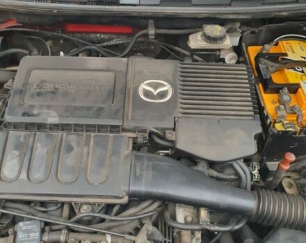 Красный Мазда 3, объемом двигателя 1.6 л и пробегом 120 тыс. км за 4000 $, фото 2 на Automoto.ua