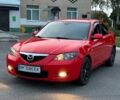 Красный Мазда 3, объемом двигателя 1.6 л и пробегом 240 тыс. км за 3518 $, фото 1 на Automoto.ua