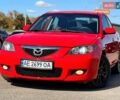 Красный Мазда 3, объемом двигателя 1.6 л и пробегом 225 тыс. км за 5800 $, фото 1 на Automoto.ua