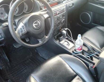 Красный Мазда 3, объемом двигателя 1.6 л и пробегом 167 тыс. км за 5999 $, фото 1 на Automoto.ua