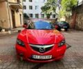 Красный Мазда 3, объемом двигателя 1.6 л и пробегом 312 тыс. км за 5999 $, фото 1 на Automoto.ua