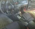 Красный Мазда 3, объемом двигателя 1.6 л и пробегом 120 тыс. км за 4000 $, фото 4 на Automoto.ua
