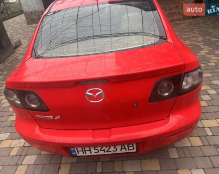 Красный Мазда 3, объемом двигателя 1.6 л и пробегом 310 тыс. км за 4500 $, фото 9 на Automoto.ua