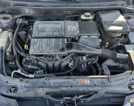 Красный Мазда 3, объемом двигателя 1.6 л и пробегом 192 тыс. км за 5500 $, фото 18 на Automoto.ua