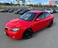 Красный Мазда 3, объемом двигателя 1.6 л и пробегом 225 тыс. км за 5800 $, фото 14 на Automoto.ua