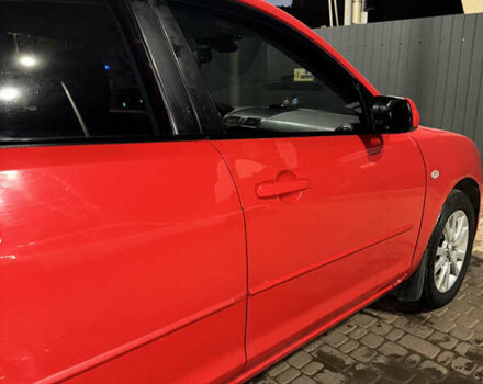 Красный Мазда 3, объемом двигателя 1.6 л и пробегом 234 тыс. км за 3999 $, фото 4 на Automoto.ua