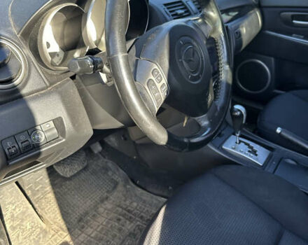 Красный Мазда 3, объемом двигателя 1.6 л и пробегом 192 тыс. км за 5500 $, фото 11 на Automoto.ua