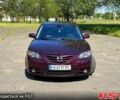 Красный Мазда 3, объемом двигателя 2 л и пробегом 250 тыс. км за 4200 $, фото 1 на Automoto.ua