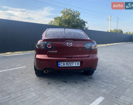 Красный Мазда 3, объемом двигателя 2 л и пробегом 244 тыс. км за 6800 $, фото 4 на Automoto.ua