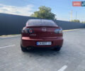 Красный Мазда 3, объемом двигателя 2 л и пробегом 244 тыс. км за 6800 $, фото 4 на Automoto.ua