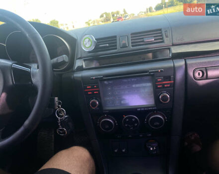 Красный Мазда 3, объемом двигателя 2 л и пробегом 244 тыс. км за 6800 $, фото 13 на Automoto.ua