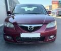 Красный Мазда 3, объемом двигателя 2 л и пробегом 247 тыс. км за 4500 $, фото 1 на Automoto.ua