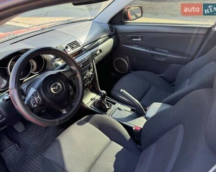 Красный Мазда 3, объемом двигателя 2 л и пробегом 240 тыс. км за 4700 $, фото 16 на Automoto.ua