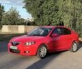 Красный Мазда 3, объемом двигателя 1.6 л и пробегом 179 тыс. км за 6200 $, фото 1 на Automoto.ua