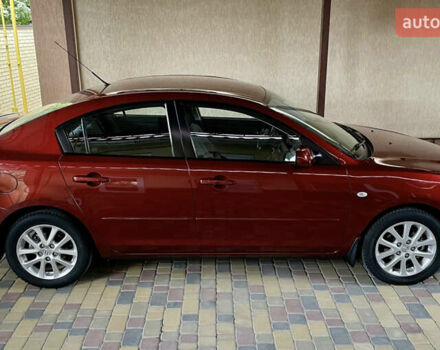 Красный Мазда 3, объемом двигателя 1.6 л и пробегом 165 тыс. км за 7600 $, фото 12 на Automoto.ua