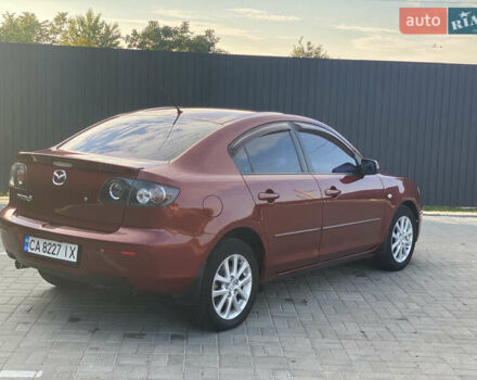 Красный Мазда 3, объемом двигателя 2 л и пробегом 244 тыс. км за 6800 $, фото 3 на Automoto.ua