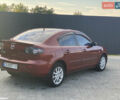Красный Мазда 3, объемом двигателя 2 л и пробегом 244 тыс. км за 6800 $, фото 3 на Automoto.ua