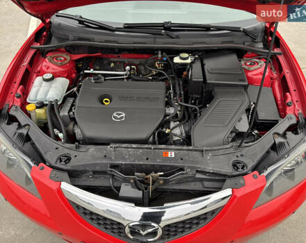 Красный Мазда 3, объемом двигателя 2 л и пробегом 205 тыс. км за 5900 $, фото 72 на Automoto.ua