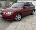 Красный Мазда 3, объемом двигателя 1.6 л и пробегом 240 тыс. км за 5999 $, фото 1 на Automoto.ua