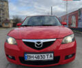 Красный Мазда 3, объемом двигателя 2 л и пробегом 243 тыс. км за 4700 $, фото 1 на Automoto.ua