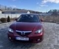 Красный Мазда 3, объемом двигателя 1.6 л и пробегом 205 тыс. км за 7000 $, фото 1 на Automoto.ua
