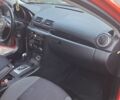 Красный Мазда 3, объемом двигателя 2 л и пробегом 190 тыс. км за 6700 $, фото 11 на Automoto.ua