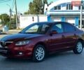 Красный Мазда 3, объемом двигателя 2 л и пробегом 192 тыс. км за 5699 $, фото 1 на Automoto.ua