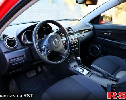 Красный Мазда 3, объемом двигателя 2 л и пробегом 203 тыс. км за 5600 $, фото 2 на Automoto.ua