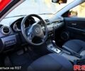 Красный Мазда 3, объемом двигателя 2 л и пробегом 203 тыс. км за 5600 $, фото 2 на Automoto.ua