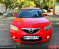 Красный Мазда 3, объемом двигателя 2 л и пробегом 200 тыс. км за 5400 $, фото 3 на Automoto.ua