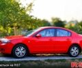 Красный Мазда 3, объемом двигателя 2 л и пробегом 203 тыс. км за 5600 $, фото 1 на Automoto.ua