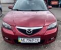 Красный Мазда 3, объемом двигателя 1.6 л и пробегом 105 тыс. км за 6200 $, фото 1 на Automoto.ua