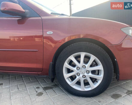 Красный Мазда 3, объемом двигателя 2 л и пробегом 244 тыс. км за 6800 $, фото 7 на Automoto.ua