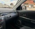 Красный Мазда 3, объемом двигателя 1.6 л и пробегом 131 тыс. км за 6890 $, фото 24 на Automoto.ua