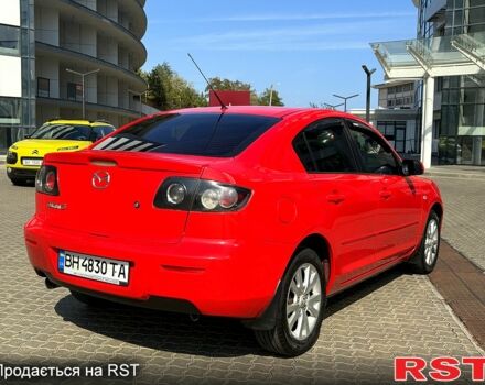 Красный Мазда 3, объемом двигателя 2 л и пробегом 250 тыс. км за 5000 $, фото 5 на Automoto.ua