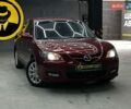 Красный Мазда 3, объемом двигателя 1.6 л и пробегом 165 тыс. км за 6800 $, фото 1 на Automoto.ua