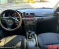 Красный Мазда 3, объемом двигателя 2 л и пробегом 200 тыс. км за 5400 $, фото 5 на Automoto.ua