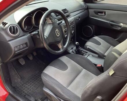 Красный Мазда 3, объемом двигателя 2 л и пробегом 160 тыс. км за 5300 $, фото 6 на Automoto.ua