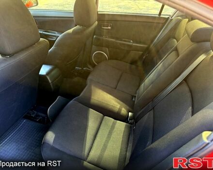 Красный Мазда 3, объемом двигателя 2 л и пробегом 200 тыс. км за 5400 $, фото 6 на Automoto.ua